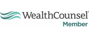 A WealthCounsel member logo featuring a golden emblem with the words "WealthCounsel Member" - The Lawler Group